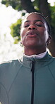 Fitness, woman and smile at park with breathing, post exercise and calm nervous system for wellness. Happy athlete, black person and exhale outdoor for workout cool down, active practice or fresh air