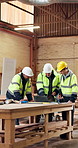 Woodwork, team and laptop in factory for discussion with positive feedback, smile or manufacturing. Happy carpenter, men and tech for production plan with engineer, worker review and quality control